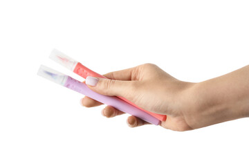 Woman holding different colorful markers on white background