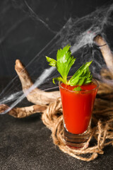 Shot of tasty bloody Mary cocktail on dark background