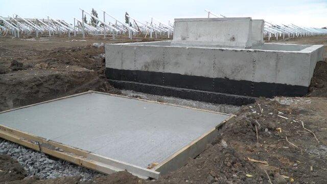 Fresh concrete in a big frame at a construction site, industrial work