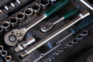 Socket wrench toolbox background. Set of tools for car repair in box, top view