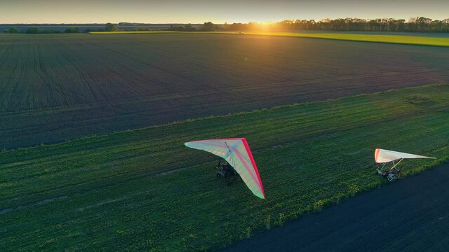 Motorized hang glider after landing on the grass runway