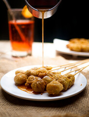 Homemade Cilor Favourite Street Food from Indonesia Made from Tapioca Flour and Egg. Decorated with red chili sauce