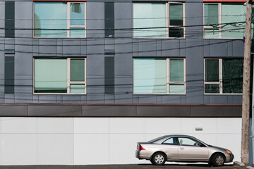Fototapeta na wymiar An apartment parking lot with car.