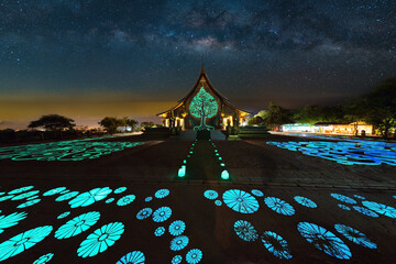 Temple Sirindhorn Wararam Phuproud in Ubon Ratchathani Province at night and The Milky Way is our...