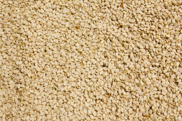 Heap of organic natural sesame seeds
