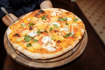 Pizza on wooden table top view. Fast food. Post blog social media. with copy space. Pizza ready to eat