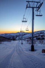 Ski lifts at sunset