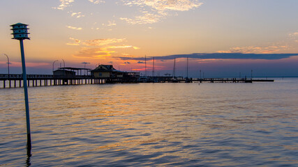 Obraz premium Sunset at the Fairhope pier
