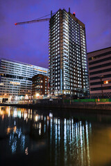 Stockholm, Sweden A view of modern buildings in the  Liljeholmskajen neighborhood at night