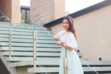 Portrait of beautiful asian woman on stairs.