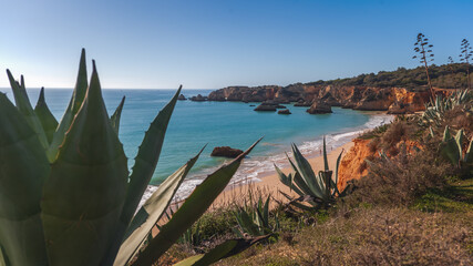 Atlantic coast in Algarve, Portugal. Beautiful bright landscape, waves and rocks on the beach - obrazy, fototapety, plakaty