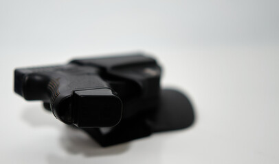 pistol magazine hand gun,ammonition ,cartridge and magazine  isolated on white with holder