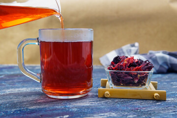 Red hibiscus herbal tea red hibiscus flower and dried herbal tea.
