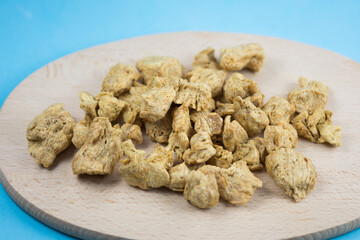 soy cubes on a wooden plate
