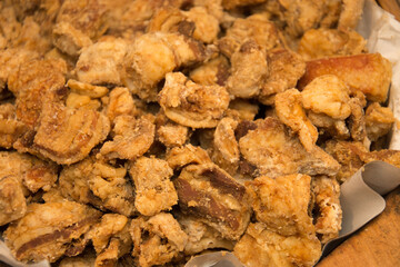 Jumari, Delicious unhealthy fried pork greaves , fish greaves