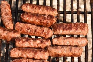 Traditional Romanian food, grilled meat rolls known as mititei