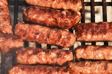 Traditional Romanian food, grilled meat rolls known as mititei