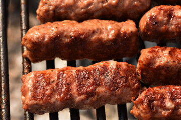 Traditional Romanian food, grilled meat rolls known as mititei