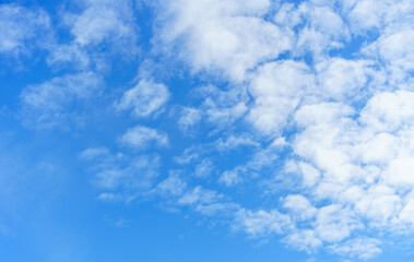 white clouds on a blue sky background 