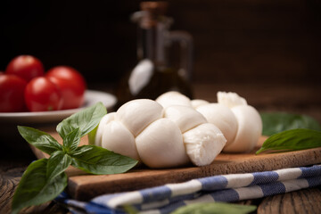 Twisted fresh Italian mozzarella Treccia. Italian soft cheese - obrazy, fototapety, plakaty