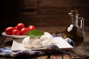 Foto op Plexiglas Twisted fresh Italian mozzarella Treccia. Italian soft cheese © Fabio Balbi