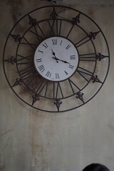 old clock on the wall of the house