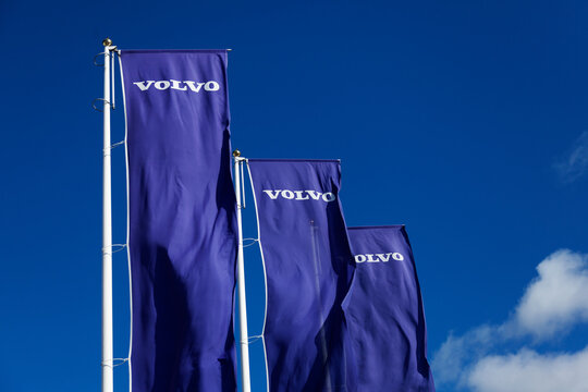 Umea, Norrland Sweden - September 1, 2021: three blue flags with well-known car brand