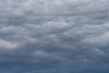 background of dark and ominous cloudy and stormy sky