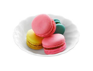 group of macaroons in ceramic cup on white background
