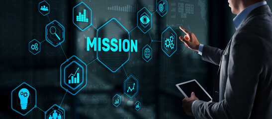 Businessman clicks on virtual screen Mission