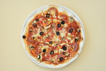 homemade pizza on black background