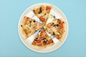 homemade pizza, with olives and salami