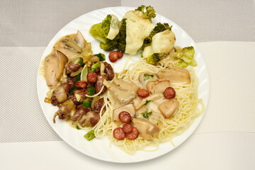 salad with cucumbers, garlic, tomatoes and cheese