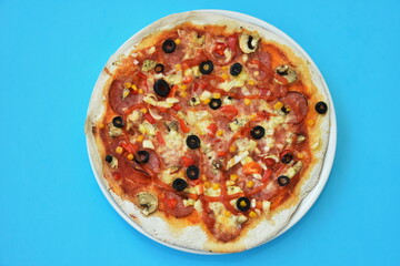 homemade pizza prepared for the oven,