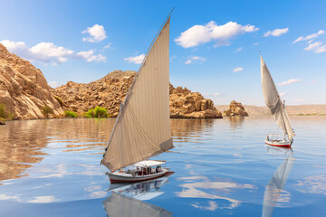 Sailboats near Agilkia island, Philae, Aswan, Upper Egypt