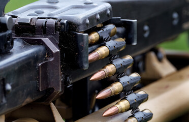 Second world war rifle and machine gun ammunition in clips and belts.,