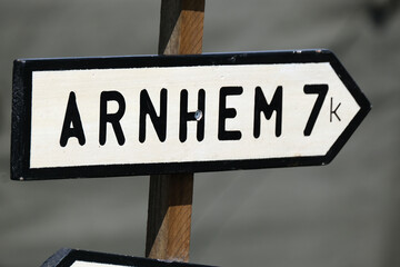Road sign depicting town deeply involved in operation Market Garden. A Bridge too far.