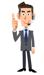 人差し指を立てて話すヘッドセットを装着した男性オペレーター
