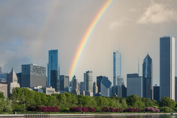 Chicago skyline along Lake Michigan in rainy day with rainbow