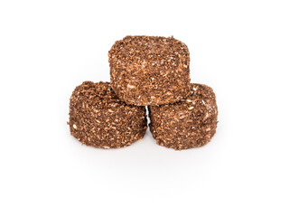 Brown Turkish delight with cocoa on a white background. Isolated. Horizontally