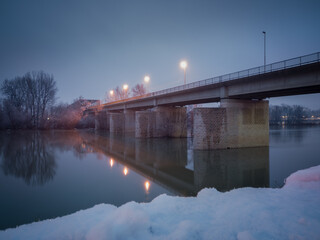 Bridge over the Sava River in Bosanski Brod, Bosnia and Herzegovina in winter at dusk