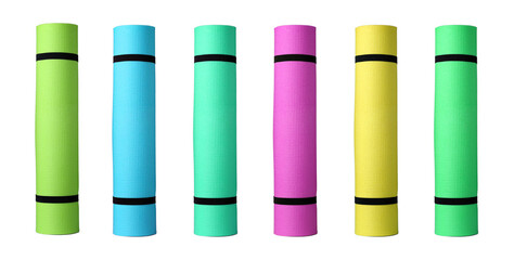 Obraz premium Set with different bright rolled camping mats on white background. Banner design