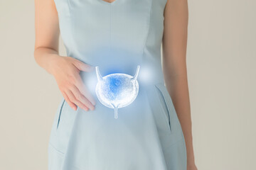 Woman in blue clothes holding virtual bladder in hand. Handrawn human organ, detox and healthcare, healthcare hospital service concept stock photo - obrazy, fototapety, plakaty