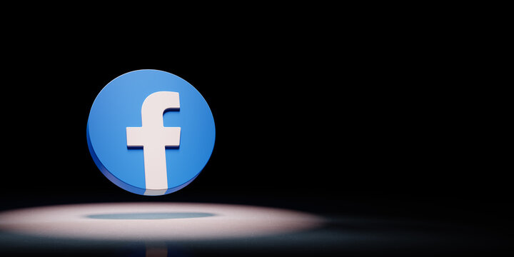 Facebook Logo Spotlighted On Black Background