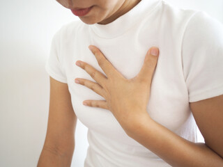 Diaphragmatic hernia. Asian woman have a burning sensation in their breasts. chest pain, shortness...