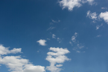 white clouds in the blue sky