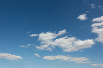 white clouds in the blue sky