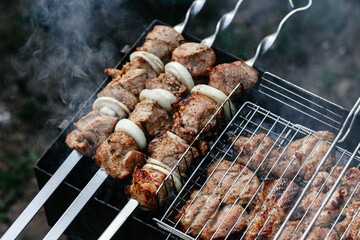 The meat is grilled on the grill. Shashlik