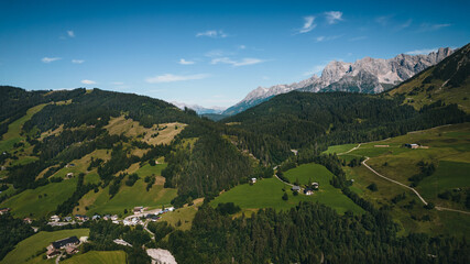 View of the mountains in Austria. Sunset with colorful clouds. Snowy mountains in Austria.