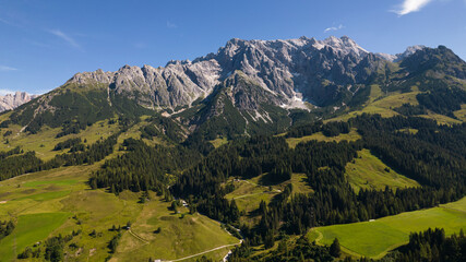 View of the mountains in Austria. Sunset with colorful clouds. Snowy mountains in Austria.